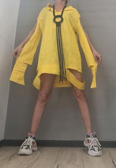 "DRESSSHOESCODE  Asymmetric Linen Dress, Avant Garde Tunic ❤️ Extravagant designs and high quality fabrics! ❤️ Materials & Care Linen Hand wash at low temperatures. Do not machine dry. Do not dry clean! ❤️ Sizing We can make your piece from XS to 5XL! Everything in the shop can be also made according to your measures free of charge! ❤️ Shipping ✈ Ready to ship The time I need to prepare an order for shipping varies. For details, see individual items. Priority shipping is used for all our package Asymmetrical Tunic For Summer, Asymmetrical Lagenlook Dresses For Spring, Yellow Asymmetrical Hem Beach Dress, Bohemian Dress With Asymmetrical Neckline, Asymmetrical Yellow Mini Dress For Spring, Yellow Asymmetrical Beach Dress, Yellow Beach Dress With Asymmetrical Hem, Spring Yellow Asymmetrical Mini Dress, Spring Beach Linen Dress With Asymmetrical Hem