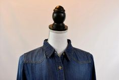 Everyone needs a denim button-up, and we love this one! It flatters a wide range of body types thanks to its dark wash and soft fabric. Chambray Button-down Material: Denim/Jean Front chest pockets Long sleeves can be rolled up Material: 100% cotton Color: Dark denim Dark Wash Washed Denim Top For Work, Collared Dark Wash Denim Top With Button Closure, Dark Wash Collared Denim Top With Button Closure, Everyday Dark Wash Button-up Denim Top, Dark Wash Denim Top With Button Closure, Everyday Dark Wash Denim Top With Button Closure, Dark Wash Denim Button-up Top With Snap Buttons, Denim Jean, Dark Denim