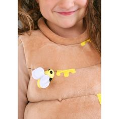 Your child will look sweet as honey in this unique toddler Beehive costume. The plush, sculpted tunic easily slips over your child's clothing with hook and loop fasteners in the back. It's detailed with drips of honey and stuffed bees sewn to the soft surface. Topped off with a sweet beehive cap, this costume will cause a buzz wherever it goes! Beehive Costume, Yellow Gloves, Sweet As Honey, Buzz Bee, Bee Costume, Apple Blossoms, Bear Costume, Hook And Loop Fasteners, Animal Costumes