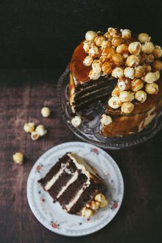 a piece of cake on a plate next to a slice of cake with caramel toppings