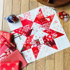 the table is covered with red and white quilts