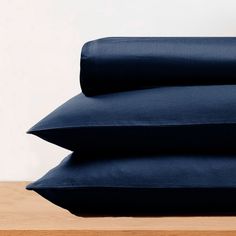 three pillows stacked on top of each other