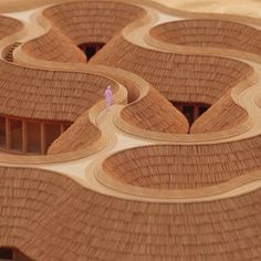 an aerial view of a building made out of wood