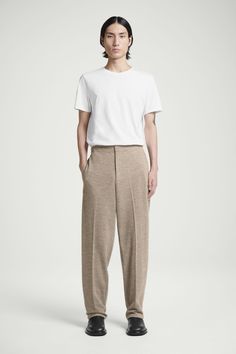 ELASTICATED BOILED-WOOL TROUSERS - DARK BEIGE - COS Beige Hat, Boiled Wool, Wool Trousers, Modern Wardrobe, Dark Beige, Animal Welfare, Basic Tee, Drawstring Waistband, Wardrobe Staples