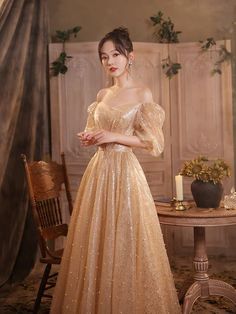 gold birthday dress, dream fairy princess dress, bow tie dressMaterial:tulleColor:as picture or custom colorNeckline:off shoulderBack details:bandageStyle:princessDress type: A-line&ltp&gtFeatures:shiny,fairy</p>&ltbr/>&ltp&gtCustomized service and Rush order are available.</p>&ltbr/>&ltp&gtThis dress could be custom made, there are no extra cost to do custom size and color.</p>&ltbr/>&ltp&gtPlease leave your phone number for Golden Dresses Aesthetic, Gala Dress Gold, Gold Dresses Aesthetic, Gold Ethereal Dress, Sun Princess Dress, Golden Princess Dress, Gold Off-shoulder Wedding Dress, Gold Off-shoulder Dress For Prom Season, Gold Off-shoulder Prom Dress