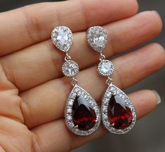 these beautiful earring made of garnet red cubic zirconia drop and sterling silver post , finished red bridal drop earrings are 1.7 '' in Length from top of the post https://www.etsy.com/shop/arbjewelry Bridal Jewelry Bracelets, Garnet Jewellery, Bridesmaid Earring, Emerald Diamond Earrings, Bridal Earring, Ear Art, Emerald Earrings Studs, Bridal Earrings Drop, Bar Stud Earrings