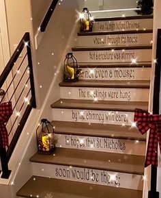 stairs decorated with christmas lights and decorations for the steps to their home are decorated with handwritten words