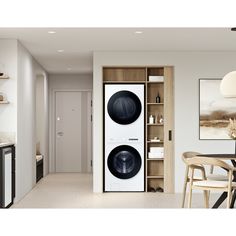 a washer and dryer sitting in a kitchen next to a dining room table