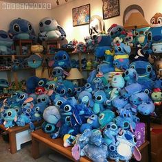 a room filled with lots of blue stuffed animals