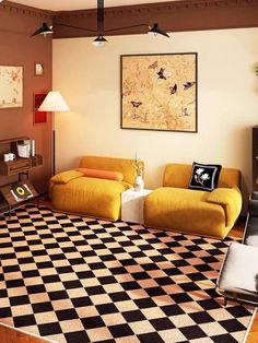 a living room with yellow couches and black and white checkered rugs on the floor