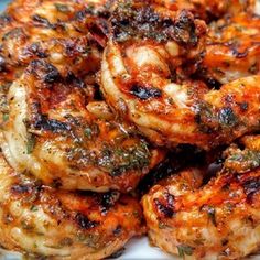 grilled shrimp is piled on top of each other