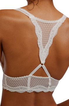 Scalloped lace and dotted mesh add a romantic feel to an unlined racerback bralette that's a perfect complement to styles with cutaway shoulders. Slips on over head Racerback 86% nylon, 14% spandex Hand wash, dry flat Imported Elegant Bra With Lace Bodice, Elegant Underwire Bra With Lace Bodice, Lace Camisole Bra With Lace Trim, Lace Bodice Bra For Weddings, Delicate Lace Bra With Lace Trim, White Lace Trim Camisole Bra, White Camisole Bra With Lace Trim, Feminine Lace With Built-in Bra, Delicate Lace Bodice Camisole