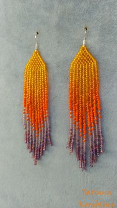 These unique handmade earrings are made of high-quality Czech beads and strong synthetic thread. They are elegant, fashionable, and highly versatile, suitable for everyday wear. Color: orange, purple . There may be some color discrepancies which is due to the different monitor settings I will make these earrings for you in your favorite size. 100% hand made with love! Measurements: Length-about 10,5cm (4.13 inch) Width -about 2 cm (0.79 inch) Materials: Sterling silver components Czech glass bea Handmade Purple Tassel Earrings With Round Beads, Handmade Purple Tassel Earrings, Orange Beaded Fringe Earrings With Round Beads, Orange Handwoven Dangle Beaded Earrings, Orange Handwoven Beaded Earrings, Adjustable Orange Tiny Beads Earrings, Adjustable Orange Beaded Fringe Earrings, Handmade Purple Beaded Earrings For Beach, Orange Dangle Earrings With Tiny Beads