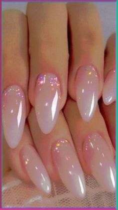 7 Easy Step-by-Step Beginner Nail Art Tutorials | Social media is full of beautiful nail art designs, from flowers and daisies, to clouds and hearts, to flames and spiders, to gorgeous ombre, marble, and water-colour looks. If you want to give yourself a DIY manicure with a little fare, this post has lots of simple videos that are easy to follow. We've also include nail art essentials to help elevate your nail art skills in a pinch! These are especially helpful for DIY French manicures! Nail Design For Oval Nails, Glitter Nail Bed, Ombre Tip Nails Almond, Natural Sparkly Acrylic Nails, Simple Chic Nails Classy Almond, Almond Color Tip Nails, French Fade Nails Almond Glitter, Opal Chrome French Tip Nails, Special Occasion Nails Almond