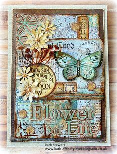 a close up of a card with flowers and a butterfly on the front, surrounded by words that spell out love