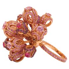 Very Rare and Beautiful 18kt Yellow Gold Moving Flower Ring Set with 15.65 ct Pink Sapphires Sapphires: Hot pink and pink sapphires together approx. 15.65ct Material: 18kt Yellow gold Ring size: 54 EU / 7 US ( can be resized for free) Total weight: 34 grams / 1.200 oz / 21.9 dwt Luxury Elegant Pink Gold Sapphire Ring, Peach Jewelry, Ring Rosegold, Pink Bling, Indian Wedding Jewelry, Pink Ring, Flower Ring, Pink Sapphire, Yellow Gold Rings