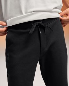 As comfy as they are cool, these sweatpants are ideal for everything – from warm-ups to chillouts. Whether you're warming up before the gym grind, running a cooldown lap, or just kicking back – you want your sweatpants to be a smooth operator. And these ultra-soft Sweat Pants constantly keep you in your comfort zone, with just the right about of stretch. Made with recycled polyester and naturally derived performance fabrics. This combination retains warmth while staying light, breathable, and sm Sweat Pant, Smooth Operator, Black Sweatpants, Active Life, Travel Workout, Sweat Pants, Sustainable Fabrics, Post Workout, Recycled Fabric