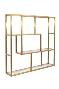 a gold shelf with three shelves on each side and two lights in the middle, against a white background