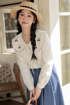 Long sleeve button up shirt with an oversized peter pan collar embroidered with cherries and scallop edges. S: 18" across shoulders, 37" chest, 23" lengthM: 18.5" across shoulders, 38.5" chest, 23" lengthL: 19" across shoulders, 40" chest, 23" lengthXL: 19.5" across shoulders, 41.5" chest, 23" length Casual Blouse With Doll Collar, Embroidered Shirt With Collared Neckline For Spring, Cotton Blouse With Detachable Collar, Casual Blouse With Cute Collar For Fall, Casual Spring Blouse With Collar, Trendy Doll Collar Top For Summer, Casual Peter Pan Collar Blouse For Daywear, Casual Blouse With Peter Pan Collar, Casual Blouse With Peter Pan Collar For Daywear