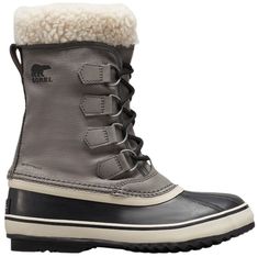 The style you want in winter boots, with the protection you expect from SOREL. This classic nylon pair features seam-sealed waterproof construction with a cozy faux shearling cuff. An extreme traction sole keeps you upright on excursions large and small. Design: Seam-sealed waterproof construction Laces are not waterproof Waterproof nylon upper 2.5 mm bonded felt frost plug Removable 6 mm washable recycled felt inner boot Durability & Traction: Handcrafted waterproof vulcanized rubber shell with Winter Boots Women Snow, Sorel Winter Carnival, Rieker Boots, Winter Carnival, Stile Casual Chic, Boots 2020, Black Riding Boots, Sorel Boots, Sorel Winter