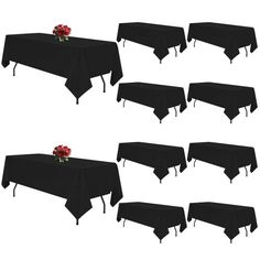 six black tablecloths with red roses on them