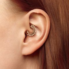 Add a unique edge to your everyday style with our 14k gold genuine diamond spiked daith ring! Materials: * 14K Solid Gold (Weight: 0.95g) - Available in yellow gold, rose gold or white gold. * Genuine or lab grown white diamond (Weight: 0.06ct VS-SI/G-H) Measurements:      Inner diameter: 5/16" - 8mm Outer diameter: 0.63" - 16mm Number of diamonds: 12 Diamond size: 1mm * Nickel free and hypoallergenic To keep your jewelry looking new, take a soft cloth or toothbrush with mild soap and gently bru Daith Ring, Daith Hoop, Daith Earring, Daith Rings, Daith Jewelry, Daith Earrings, Daith Piercing, Diamond Sizes, Jewelry Earrings Hoops