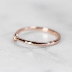 Emmie Contour Point Diamond Wedding Band - Midwinter Co. Alternative Bridal Rings and Modern Fine Jewelry Minimalist Diamond Stackable Rings With Accents, Minimalist Stackable Diamond Rings With Accents, Minimalist Stackable Rings With Diamond Accents, Minimalist 14k Gold Wedding Ring With Diamond Accents, Minimalist Diamond Ring With Accents For Promise, Minimalist Rose Gold Rings With Single Cut Diamonds, Minimalist Rose Gold Diamond Wedding Ring, Minimalist Diamond Half Eternity Stackable Rings, Minimalist Diamond White Open Band Diamond Ring