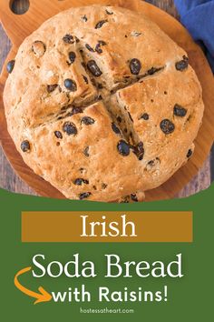 irish soda bread with raisins on a cutting board