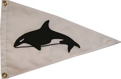 an orca whale flag hanging on a wall