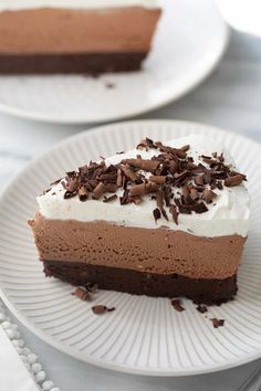 a slice of chocolate mousse cake on a plate with the text gluten - free chocolate mousse cake