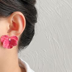 Elevate your style with our exquisite hand-painted enamel pink viola oleander earrings. Measuring 2.9cm x 2.8cm, these delicate floral-inspired earrings are a perfect blend of elegance and artistry. Crafted with precision and adorned with intricate detailing, these earrings capture the beauty of nature in every stroke. The soft pink hues create a harmonious balance between femininity and sophistication, making them a versatile accessory for any occasion. Add a touch of grace to your ensemble wit Rose Red Flower Drop Earrings, Rose Red Flower-shaped Earrings, Rose Red Flower Earrings, Rose Red Flower Earrings For Pierced Ears, Pink Drop Earrings With Birth Flower, Pink Birth Flower Drop Earrings, Pink Birth Flower Earrings For Wedding, Rose Gold Petal Earrings, Pink Petal-shaped Earrings For Spring