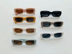 Your favorite pair of sunnies, but in matte. When it comes to trendy sunglasses, the "chunky" look is in! These rectangular shades, available in a variety of colors, will match just about anything in your child's wardrobe. Rectangular Shades Glasses, Shades Glasses, Color Crema, Trendy Sunglasses, Mocha, Sunnies, Shades, Things To Come, Sunglasses