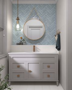 a bathroom with a sink, mirror and hanging light fixture in it's corner