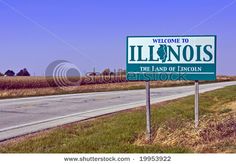 a welcome sign to illinois on the road