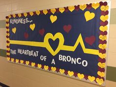 a bulletin board with hearts and a stethoscope on it