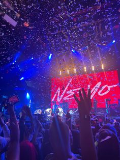 confetti is thrown in the air at a concert