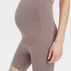 Update your separates closet for pregnancy and beyond with these Shapewear Maternity Bike Shorts from Isabel Maternity by Ingrid & Isabel™. These high-rise shapewear bike shorts are tailored in a classic fit and crafted from a soft and stretchy fabric for comfy movement, while the over-belly panel supports your growing baby bump. Designed in a solid hue, you can pair them with anything from tanks to tees to create an array of comfortable outfits. Seamless Fitted Maternity Bottoms, Fitted Seamless Maternity Bottoms, Pre Pregnancy, Baby Bump, Baby Bumps, Bike Shorts, Comfortable Outfits, Stretchy Fabric, Bump