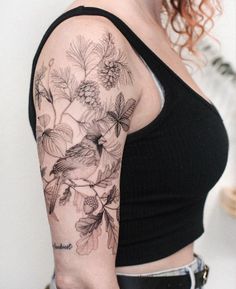 a woman with a tattoo on her arm