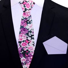 This silk necktie in shades of pink with white and dark green floret patterns blends a touch of whimsy with classic elegance. The soft pink base is beautifully contrasted by the white and dark green floret design, adding a unique visual texture that feels both fresh and sophisticated. This tie is perfect for occasions where a refined yet lively look is desired. Dress Shirts: White Dress Shirt: A white dress shirt highlights the vibrant pink and floret pattern of the tie, creating a crisp and cle Elegant Floral Print Accessories For Black Tie, Elegant Pink Ties For Semi-formal Occasions, Elegant Patterned Tie With Floral Print, Formal White Suit And Tie Accessories With Floral Print, Formal White Floral Print Suit And Tie Accessories, Classic Floral Suit And Tie Accessories For Spring, Classic Floral Print Suit And Tie Accessories For Spring, Elegant Floral Print Ties For Spring, Elegant Floral Print Ties As Gift