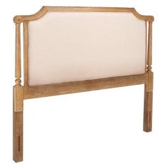 the headboard is made from wood and has white fabric