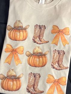 🎃 This is a child's small tee pumpkins & boots, Bella canvas tee. Comfortable fitting. Plenty of stretch, true to size. 🎃 1 size left, color in beige and orange graphic. Made by me!  🎃Please contact me with any issues or concerns regarding your order. White Western Style T-shirt For Fall, Orange Graphic, Bella Canvas Tees, Holiday Deals, Made By Me, Pumpkins, Bella Canvas, Buffalo, Gender Neutral