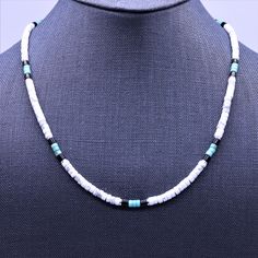 "This Native American inspired beaded heishi necklace is made with natural white buffalo turquoise from Nevada, blue green turquoise, black onyx, and sterling silver spacer beads. The beads are uniform in size, making for a clean flowing pattern of semi precious gemstones. The AAA grade white buffalo turquoise beads are beautiful shades of gray and white polished to a fine quality semi gloss luster that compliments that of the green turquoise and black onyx. White Buffalo Turquoise This rare whi Beaded Necklace Native, Flowing Pattern, Silver Beaded Necklace, Heishi Necklace, White Buffalo Turquoise, Boho Choker, Turquoise Bead Necklaces, Silver Bead Necklace, Necklace Blue