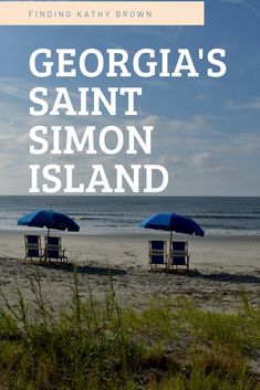 two chairs and umbrellas on the beach with text that reads, georgia's saint simon island