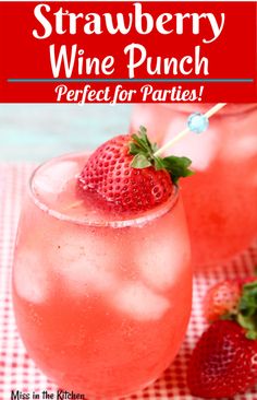 two glasses filled with pink lemonade and strawberries on a checkered tablecloth