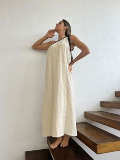 ALLE BOHO "GRECIA" Beach One Shoulder Maxi Dress, features a one-shoulder dress with a cotton braid adorning it, wear it as a bikini cover-up, or for an evening event, the fabric is very light and comfortable. This maxi dress is everything that you want for your next vacation. We are so proud to make Artisanal Clothing using only RAW Cotton that feels and looks very basic and natural. Our clothes do not only look natural and beautiful but they are also made in the most natural and beautiful way. One-shoulder Maxi Dress For Beach Season, Casual One Shoulder Maxi Dress For Beach, Casual One-shoulder Maxi Dress For Beach, Cotton One-shoulder Dress For Vacation, One Shoulder Cotton Dress For Vacation, Beige Summer Dress With Asymmetrical Neckline, Summer Cotton Dress With Asymmetrical Neckline, Cotton Summer Dress With Asymmetrical Neckline, Cotton Dress With Asymmetrical Neckline For Summer