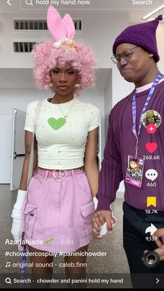 two people standing next to each other with pink hair and bunny ears on their heads