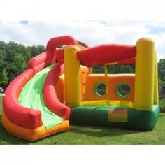 an inflatable water slide on the grass