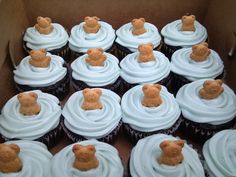 there are many cupcakes with teddy bears on them