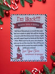 a christmas letter to santa claus on a red background with candy canes and decorations