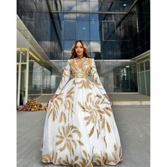 Habesha Wedding Dress Handwoven Habesha Kemis Modern Habesha Libs Eritrean Dress ሀበሻ ቀሚስ ሀበሻ ልብስ Festive Elegant Ball Gown With Fitted Bodice, Elegant Festive Ball Gown For Formal Occasions, Elegant Festive Formal Ball Gown, Elegant Festive Ball Gown, Eid Reception Dress With Gold Embroidery, Elegant Floor-length Wedding Dress For Festive Season, Bollywood Style Dress With Gold Embroidery For Reception, Gold Long Sleeve Gown With Zari Work, Gold Zari Work Long Sleeve Gown